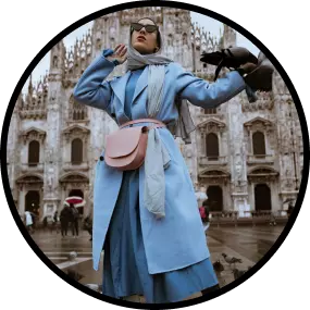 a girl in a blue coat and glasses