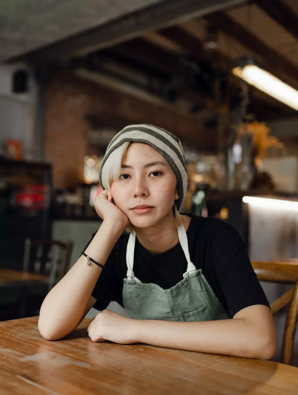 a girl with blond hair and a hat