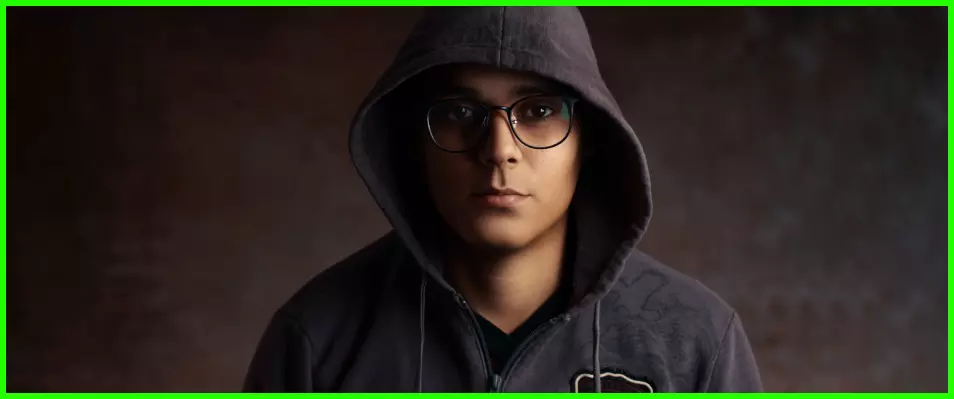 a guy in a hood and glasses