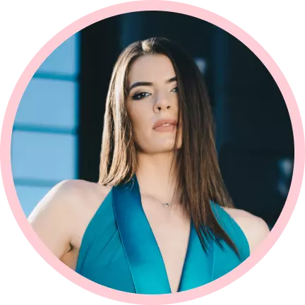 a girl in a blue dress with long hair