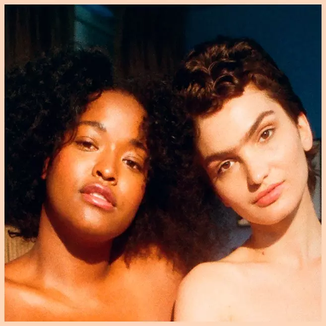 two girls with curly hair
