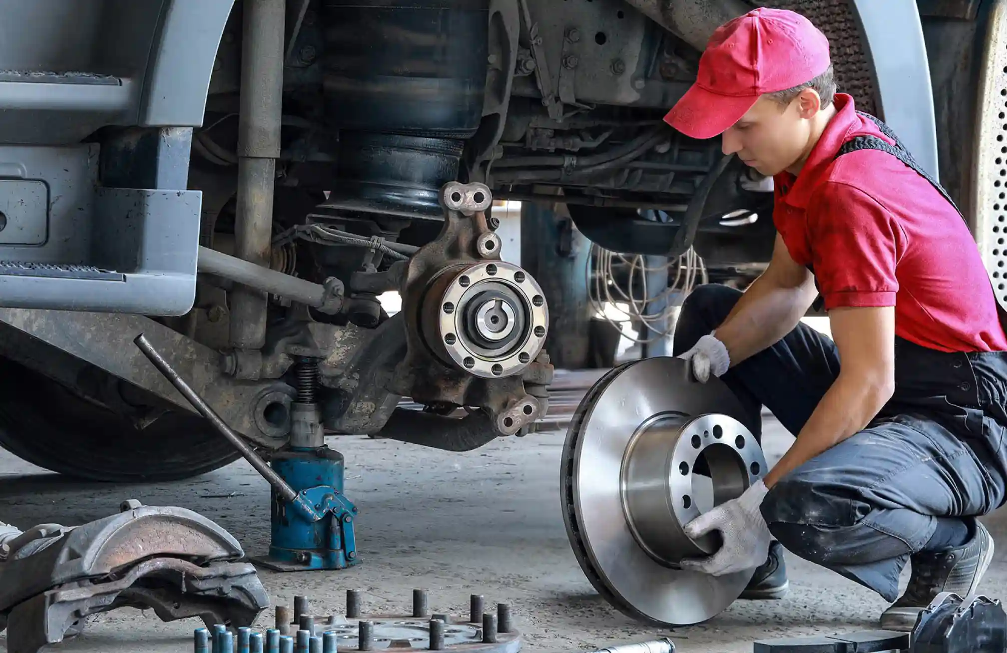 a man is repairing a wheel