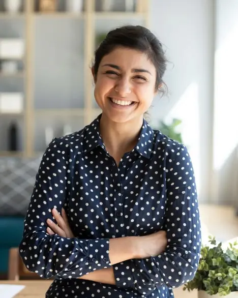 a girl in a dress smiles