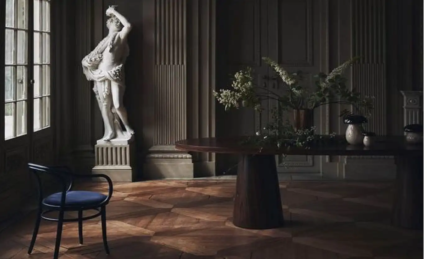 a white statue stands in the room