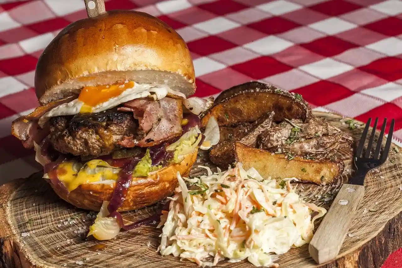 burger with potatoes and salad