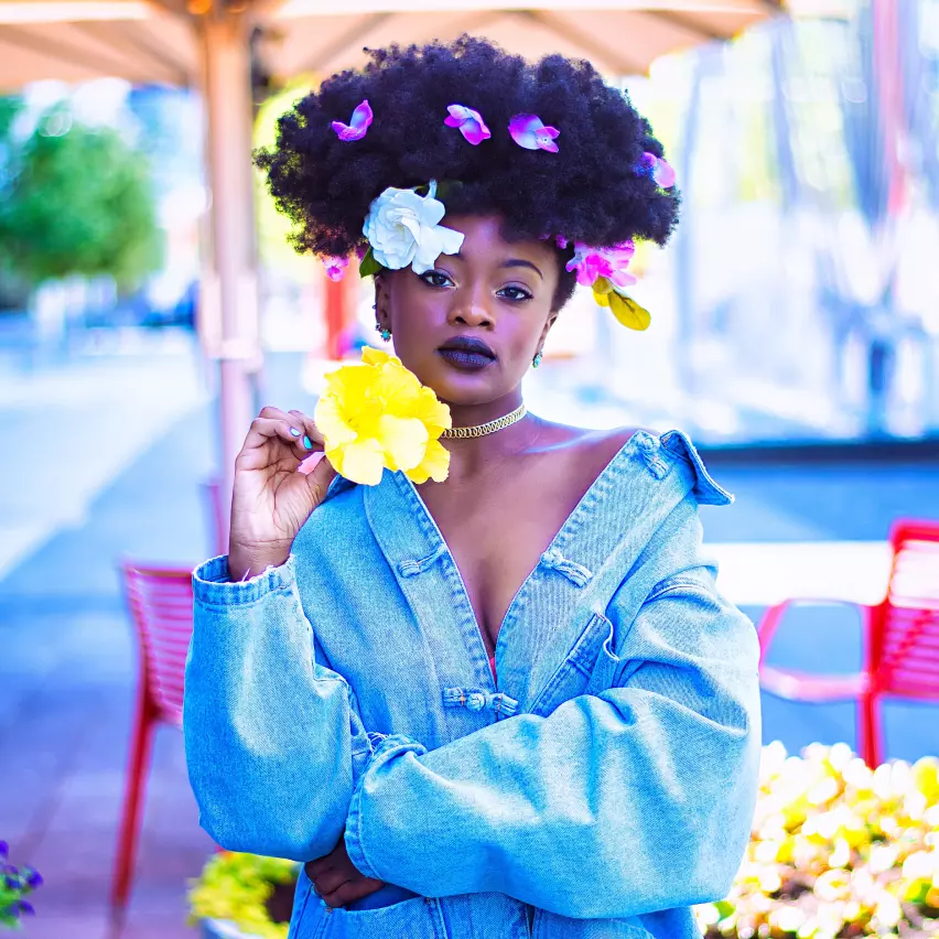 the girl near the flowers