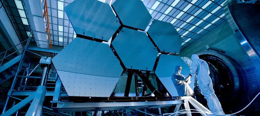 a man stands in the laboratory near the plates