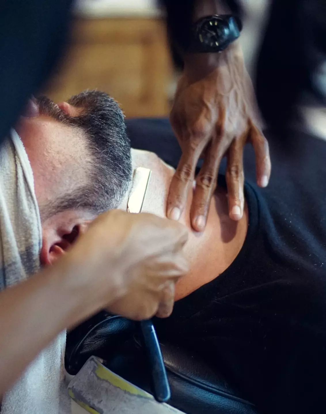 a man shaves his beard