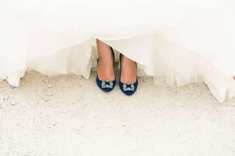 the girl's feet with the shoes on
