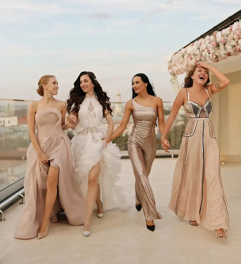 four girls holding hands