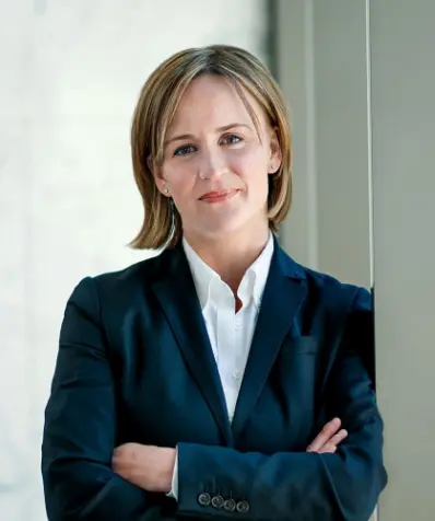 a girl in a dark suit