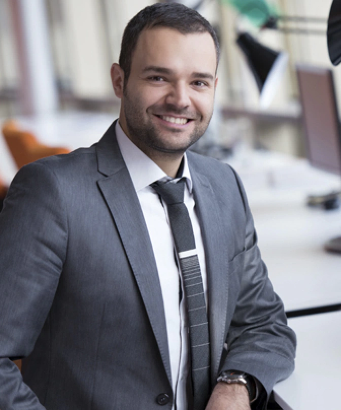a man in a gray suit
