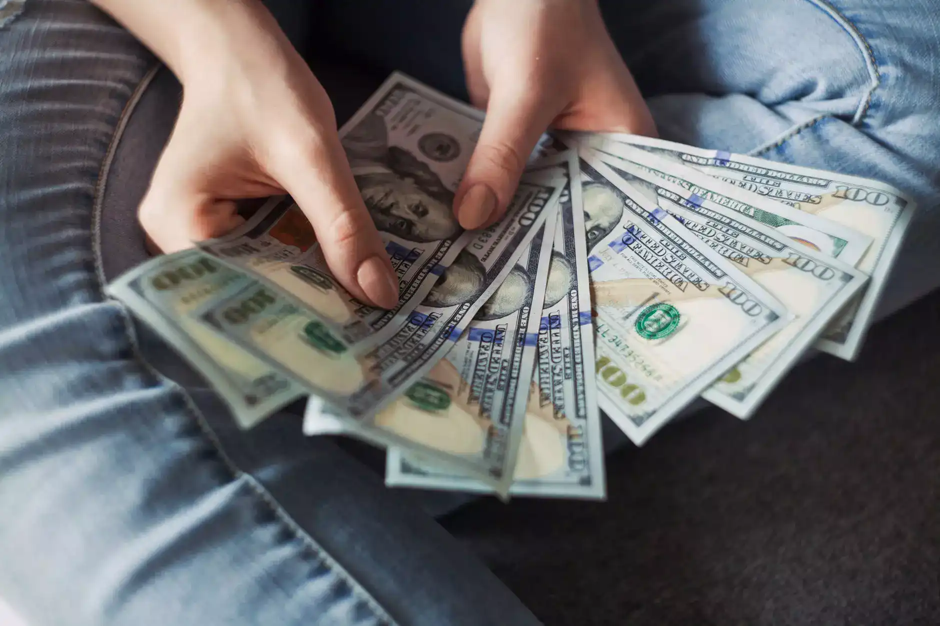 a man holds money in his hands