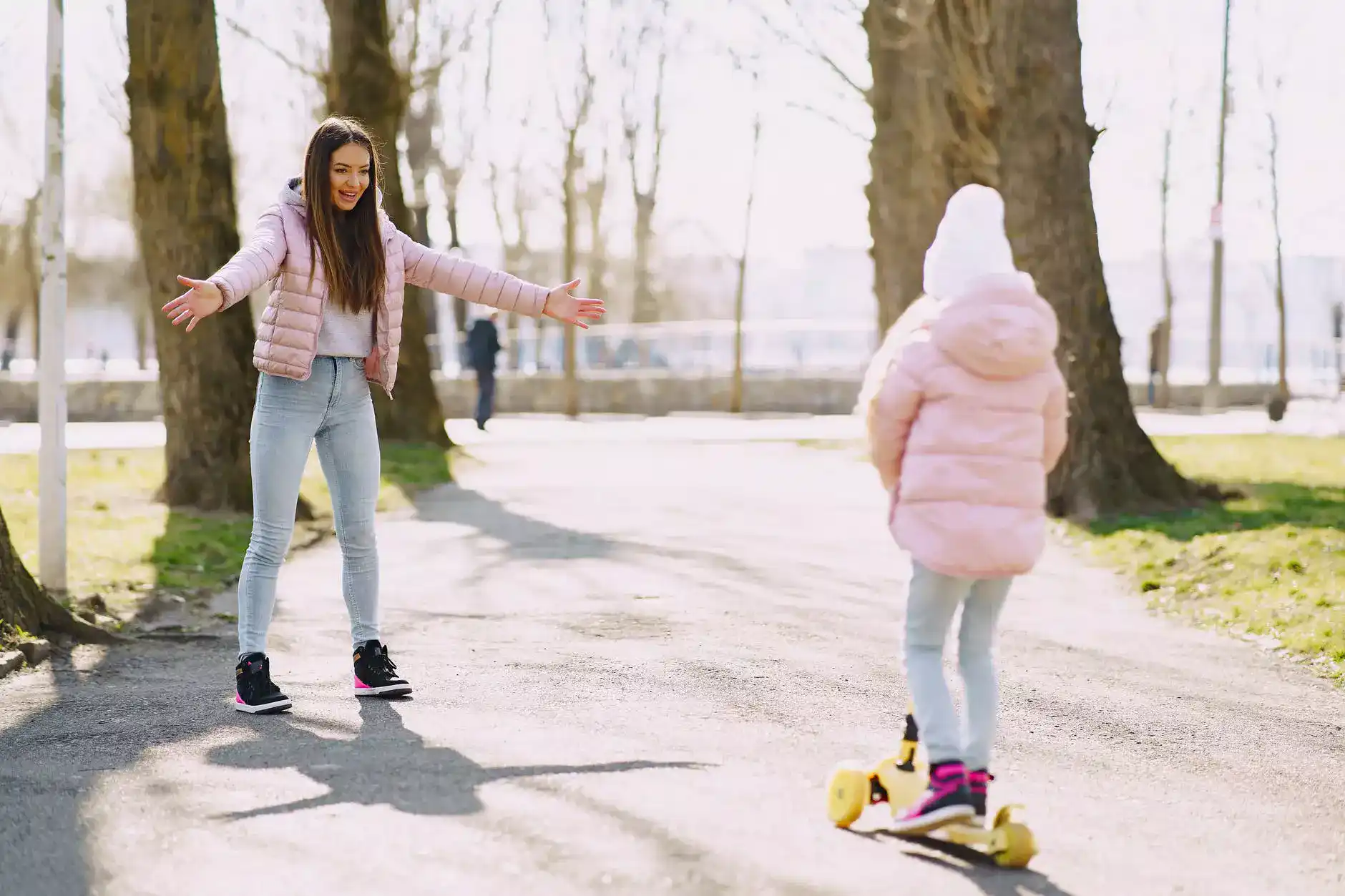 two girls walking in the park
