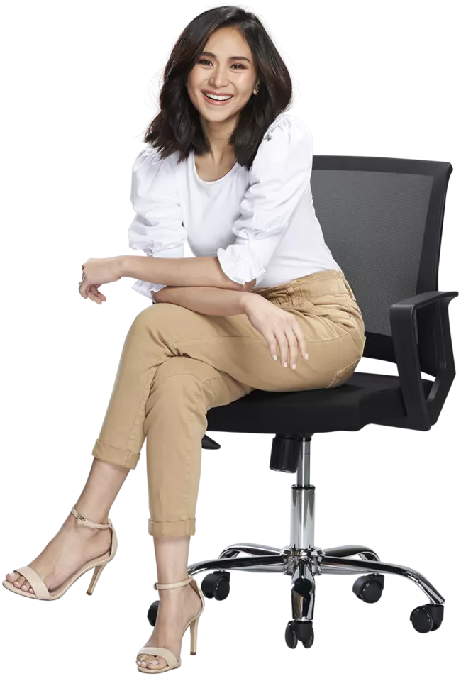the girl is sitting in a chair