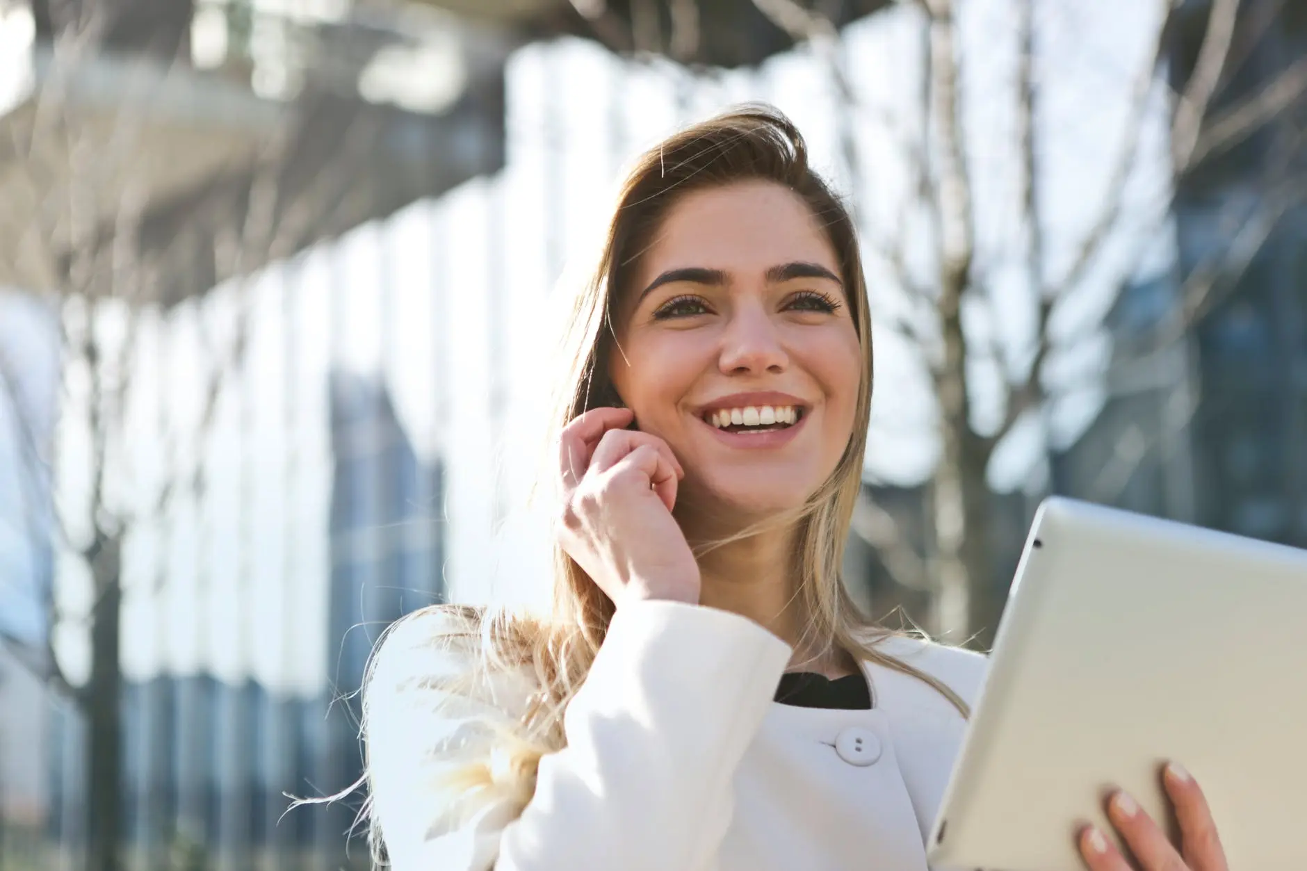 a girl is talking on the phone