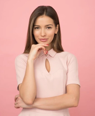 a girl in a pink dress