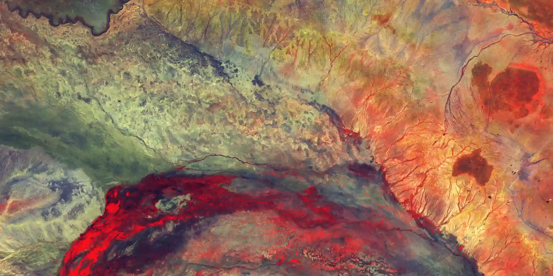 red yellow green painting of part of the earth