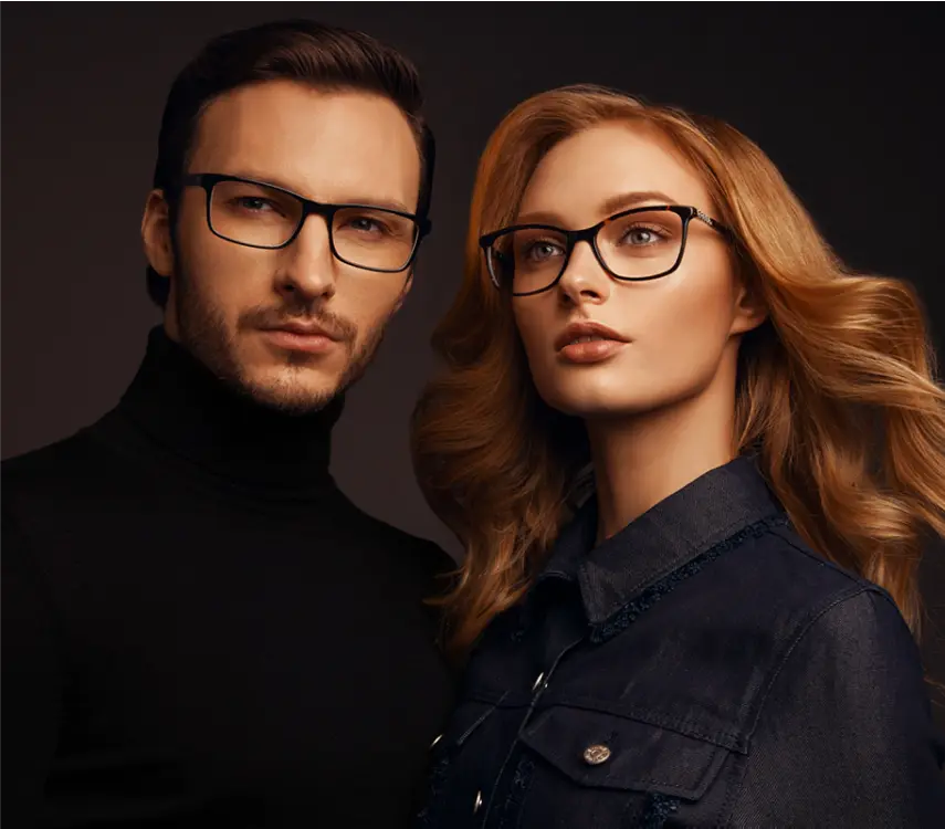 a man and a woman in dark clothes