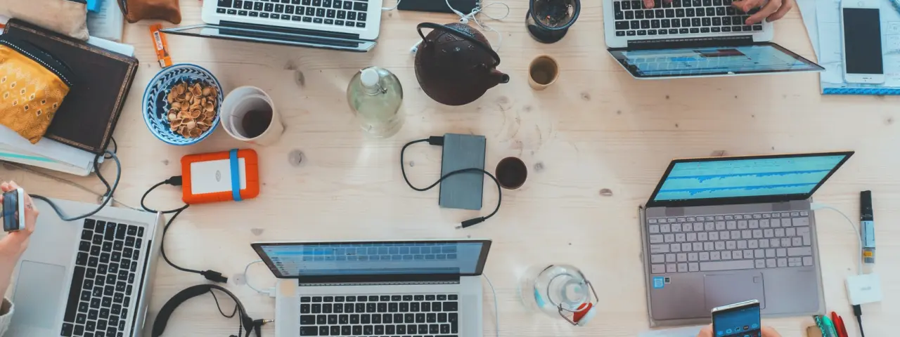 a desktop with laptops on it