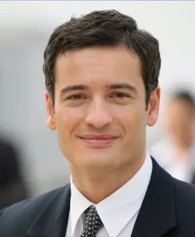 the man smiles