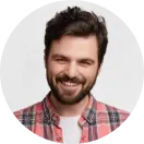 a guy in a shirt with a beard