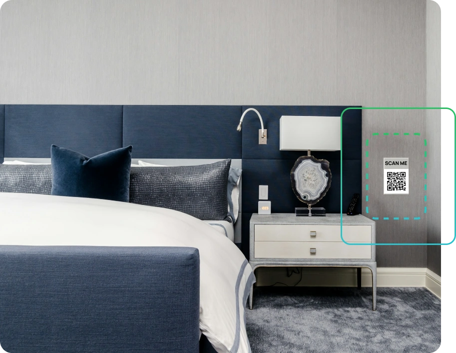 a bedroom with king-sized bed and navy blue decorations