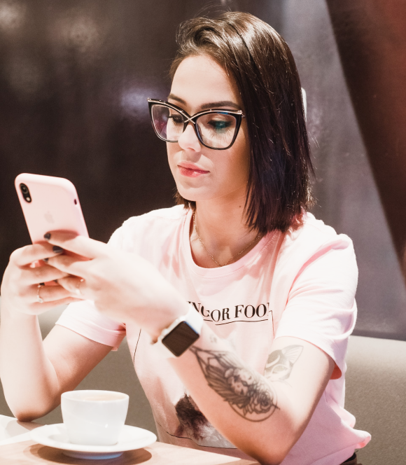 a girl looks at her phone