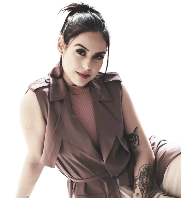 a girl with a tattoo on her arm