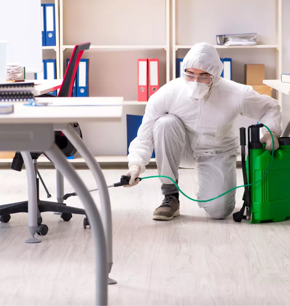 a man in a white protective suit