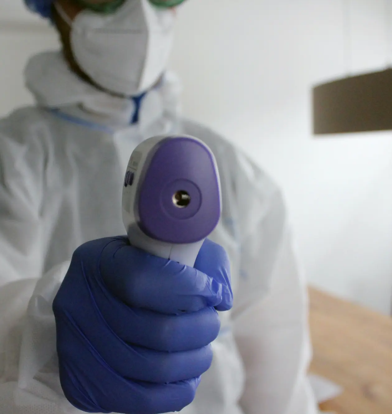 a man in a white protective suit