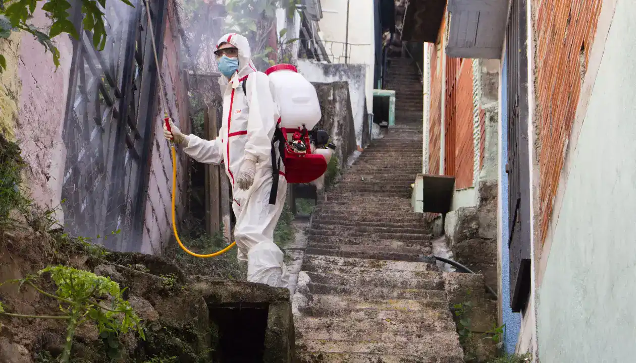 a man in a white protective suit
