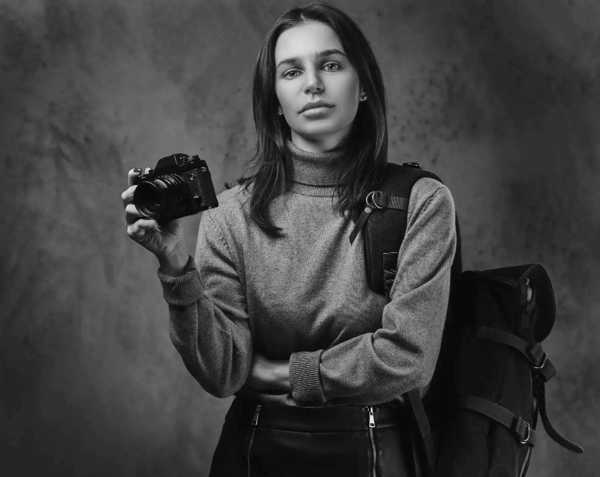 dívka držící fotoaparát