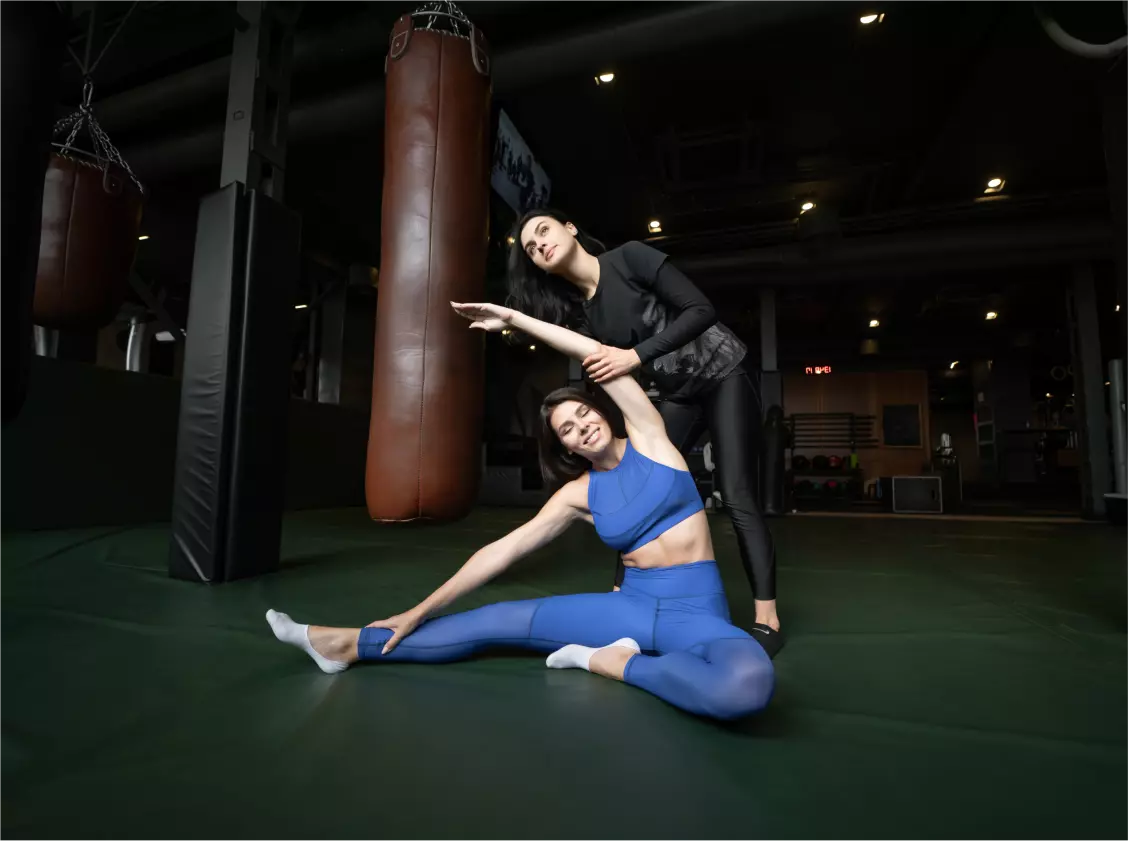 two girls doing an exercise