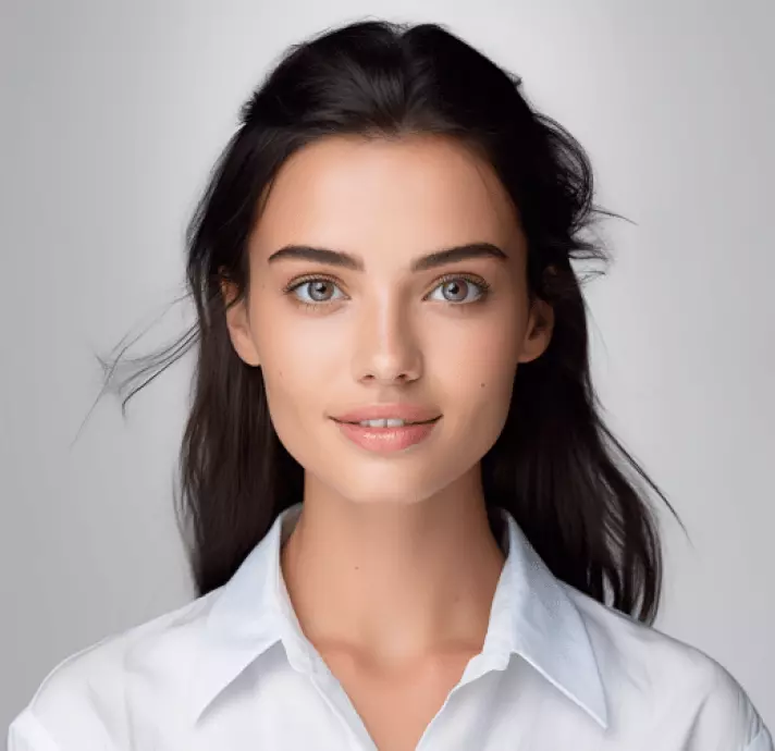 une fille en chemise blanche avec de longs cheveux
