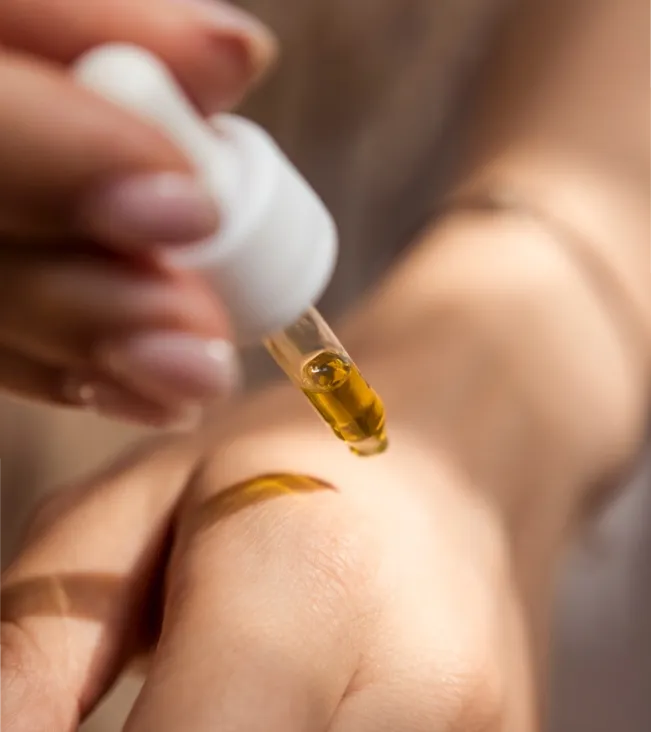 Using a pipette, drip the product onto your hand.