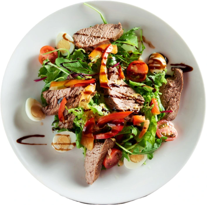 Salade tiède de légumes avec viande