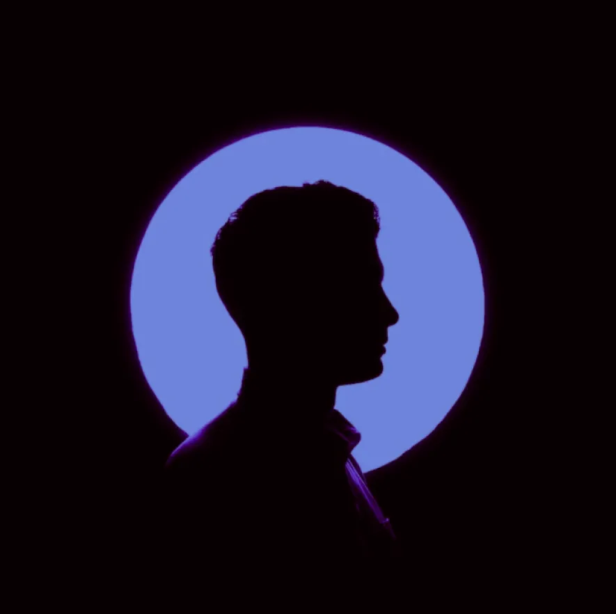 The man on the blue background