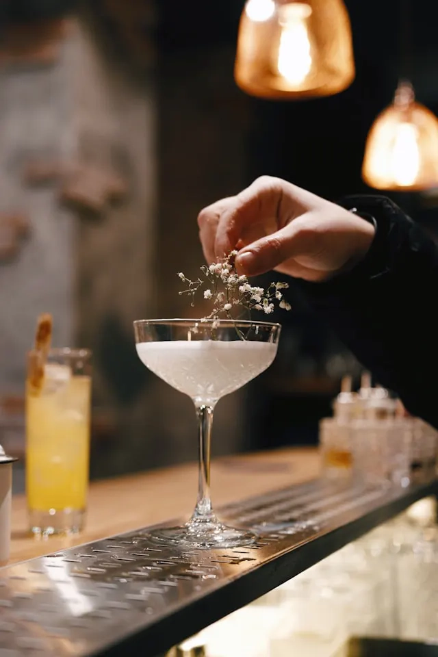 White drink in a glass with a long stem