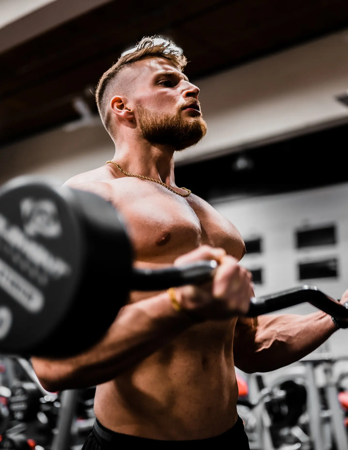 A man working out with a barbell.