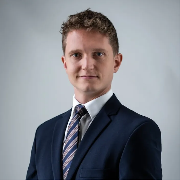 A young guy with a classic blue suit