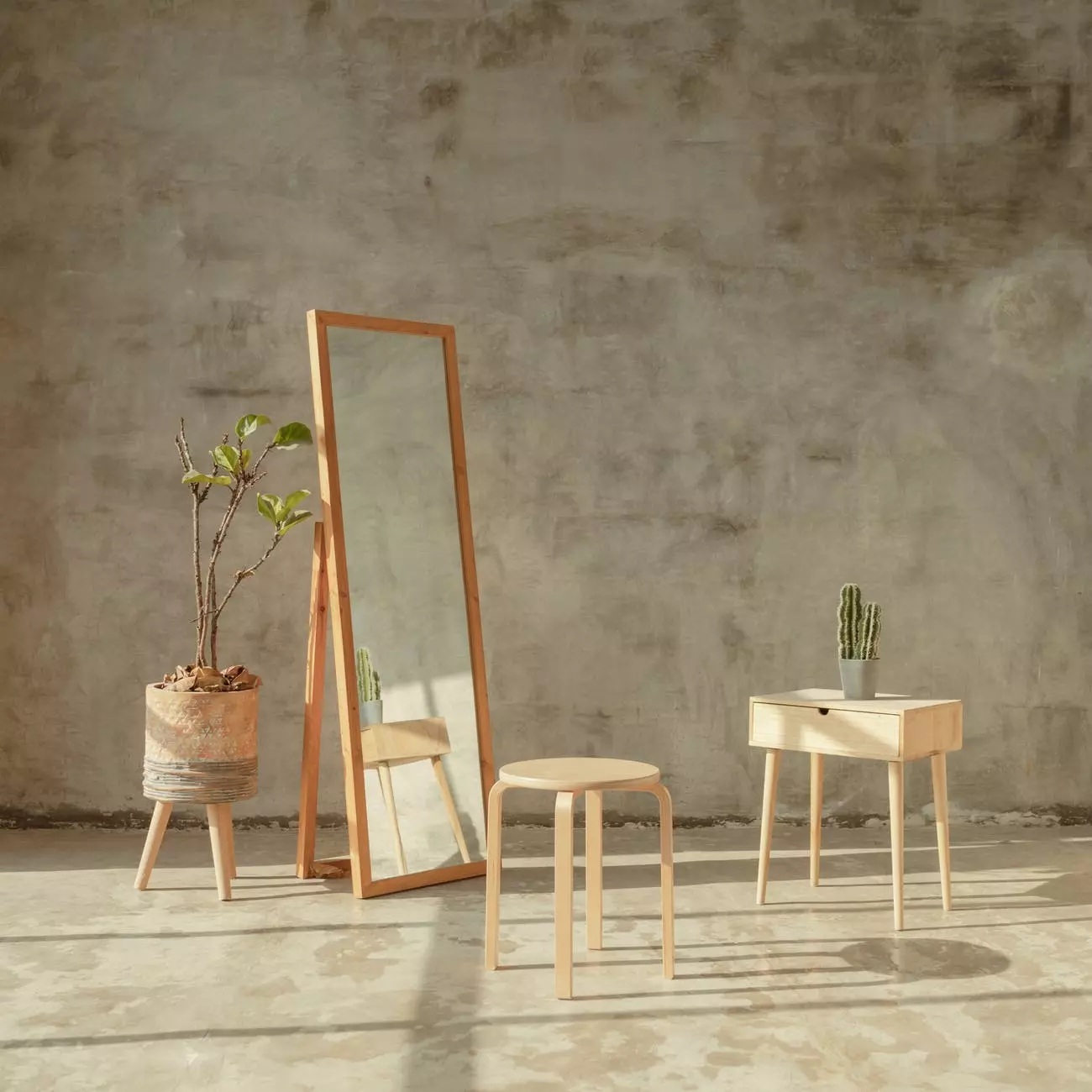 a mirror and a chair and a table next to it