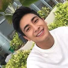 a man in a white T-shirt