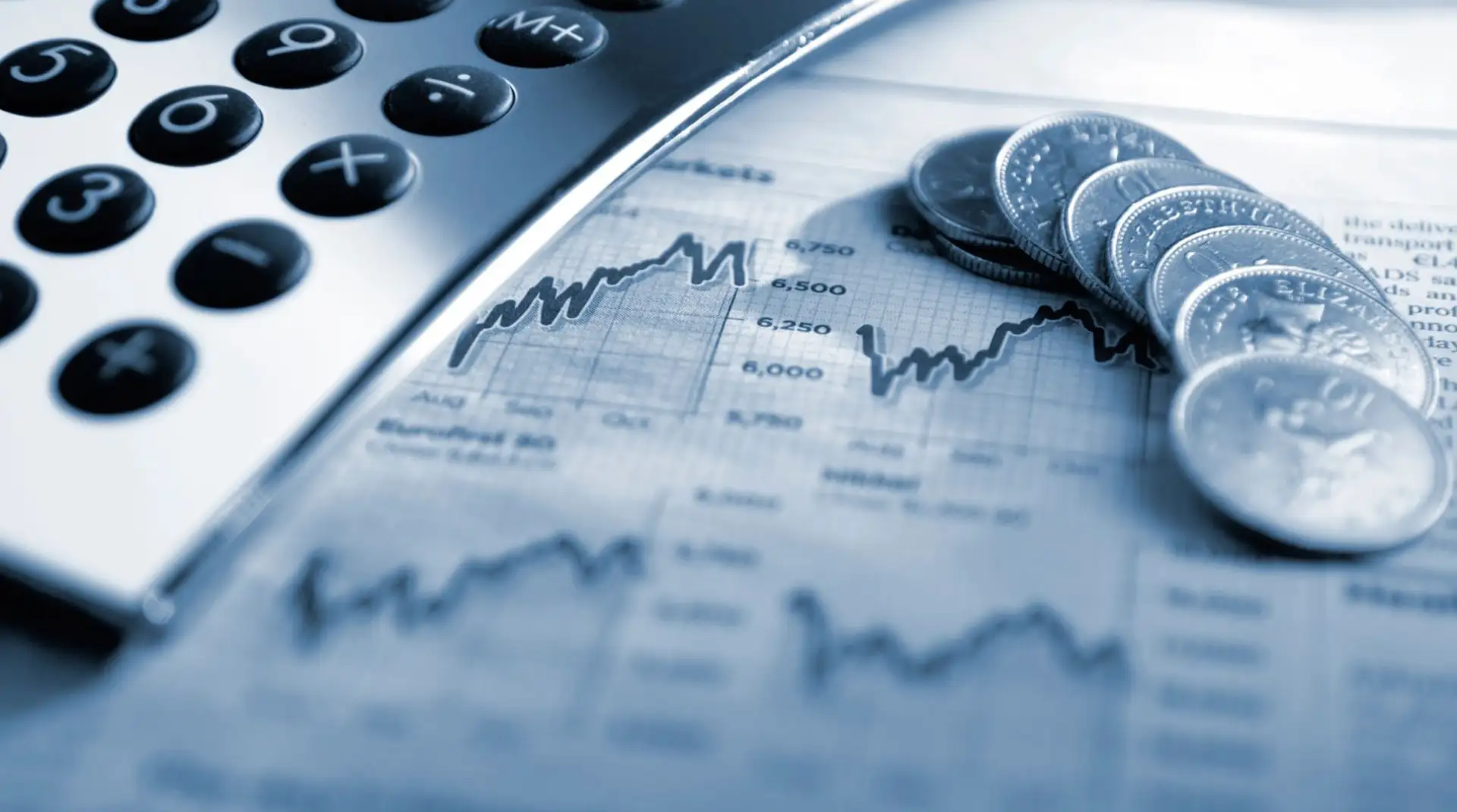 coins and a nearby calculator