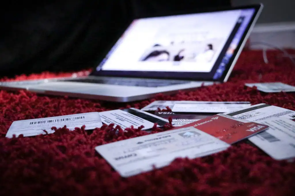 a laptop with leaflets near it
