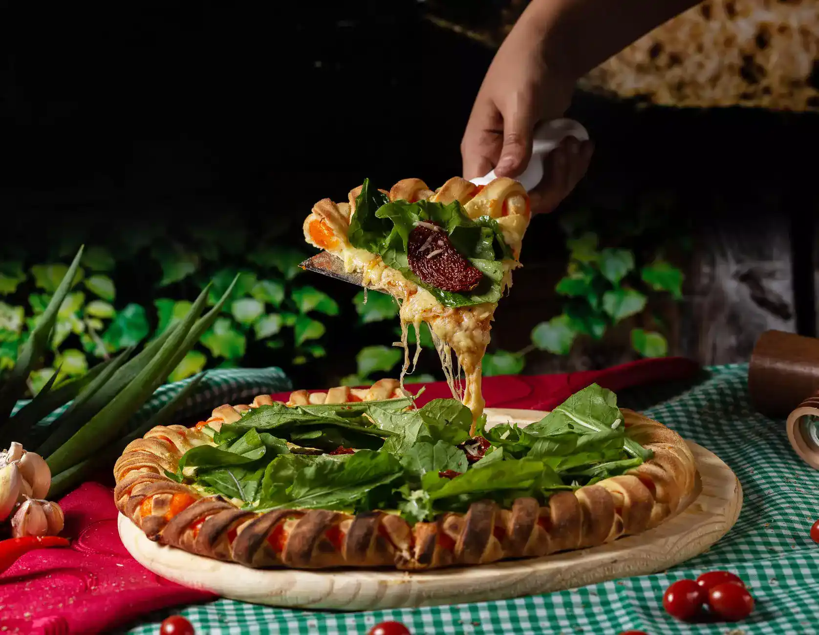 pizza with lots of greens on it