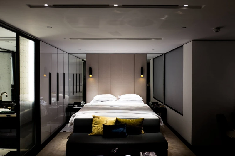 large bed and a sofa next to it