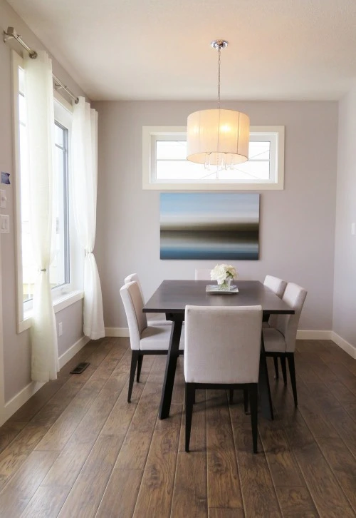 a room with a table and chairs