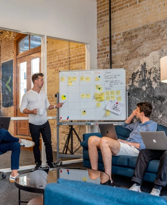Three employees are planning next week at work