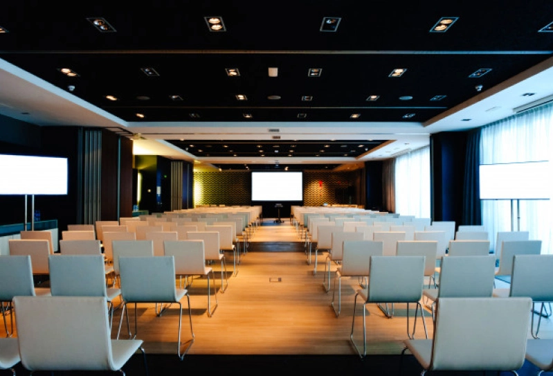 a conference room with no attendees and nice window lighting